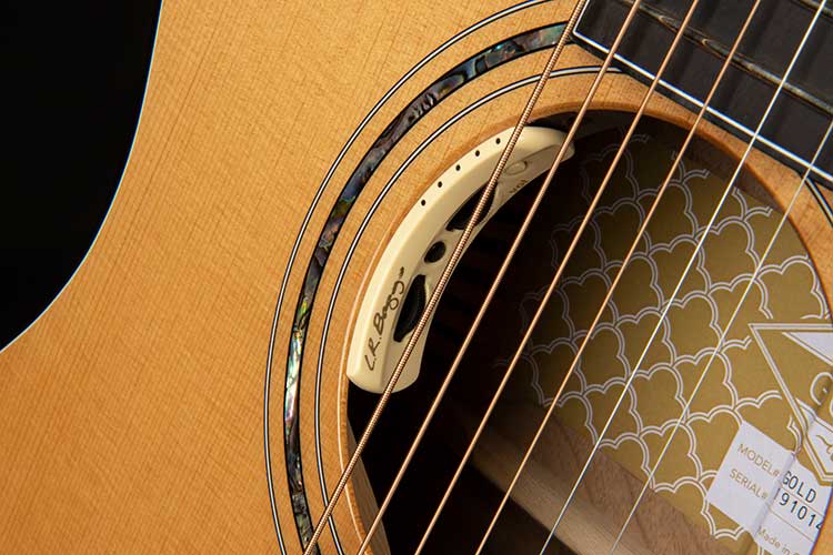 Closeup photo of the Cort Gold-Edge acoustic-electric guitar's soundhole mounted L.R. Baggs Anthem preamp controls